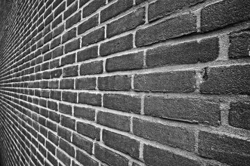 Comment réparer un mur de briques fissuré